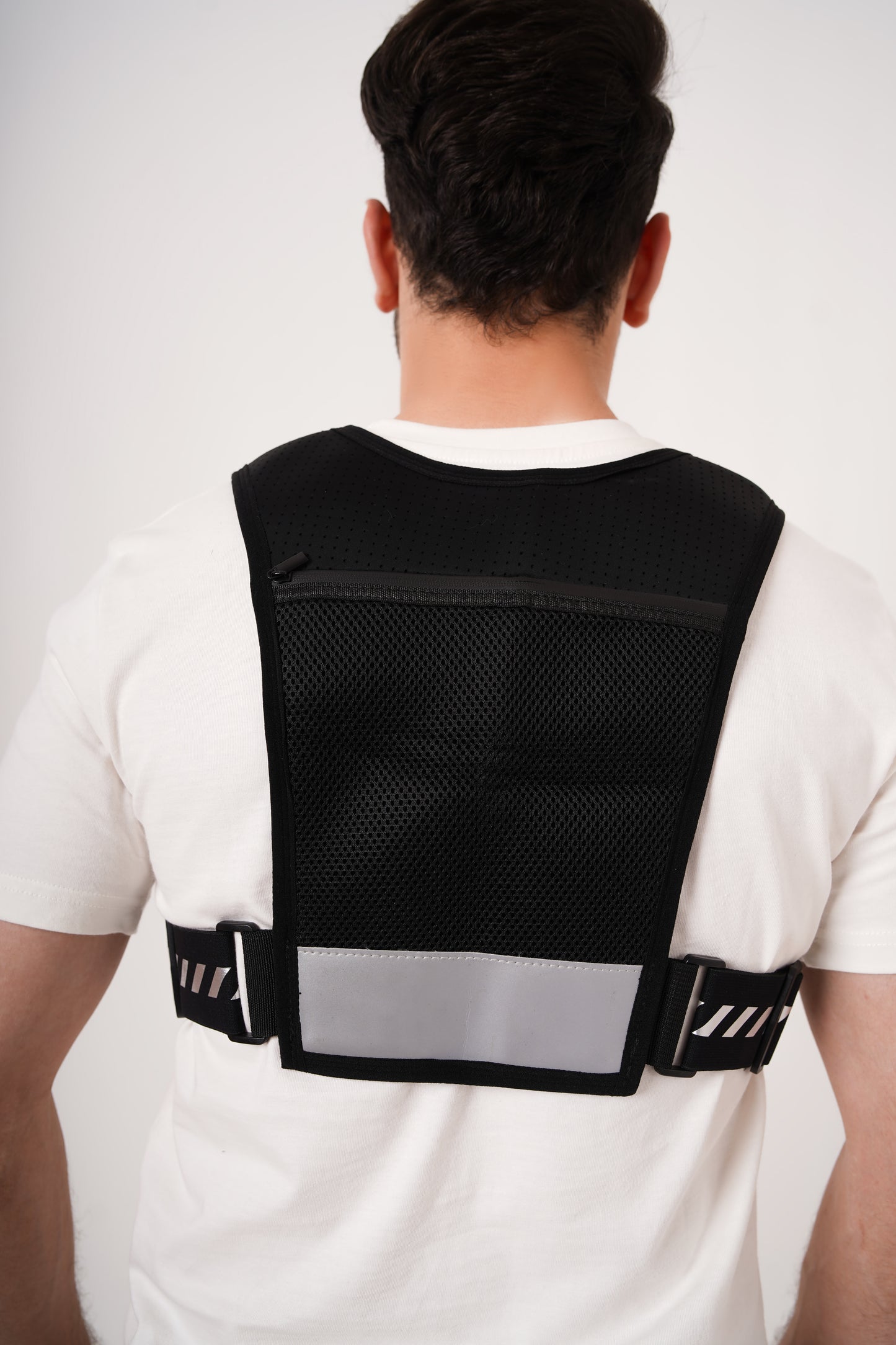 Running Vest with Water Bottle and Towel - Adjustable Unisex Reflective Vest with Phone Holder and Storage